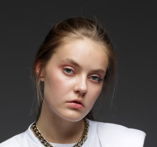 Woman in white blazer portrait